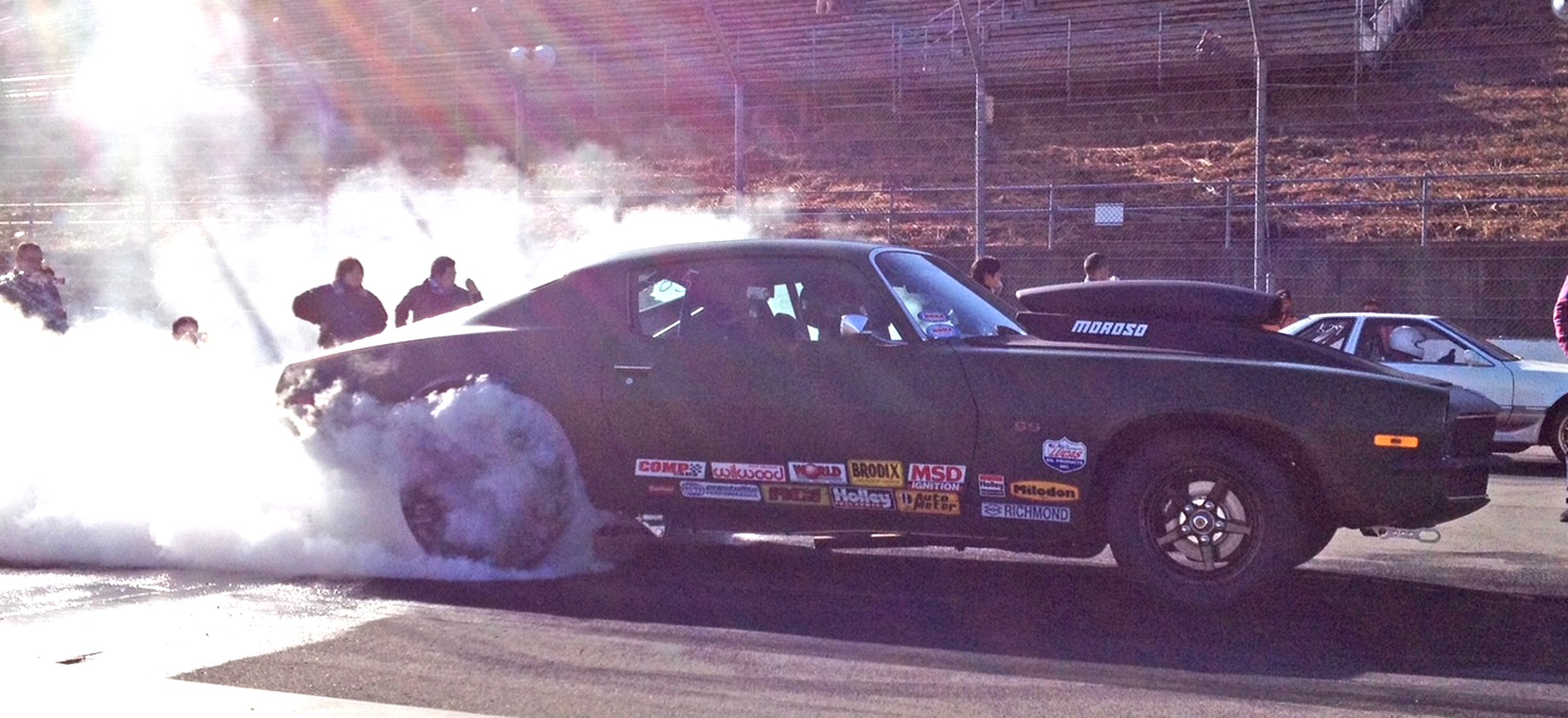 Drag strip night — muscle car staging